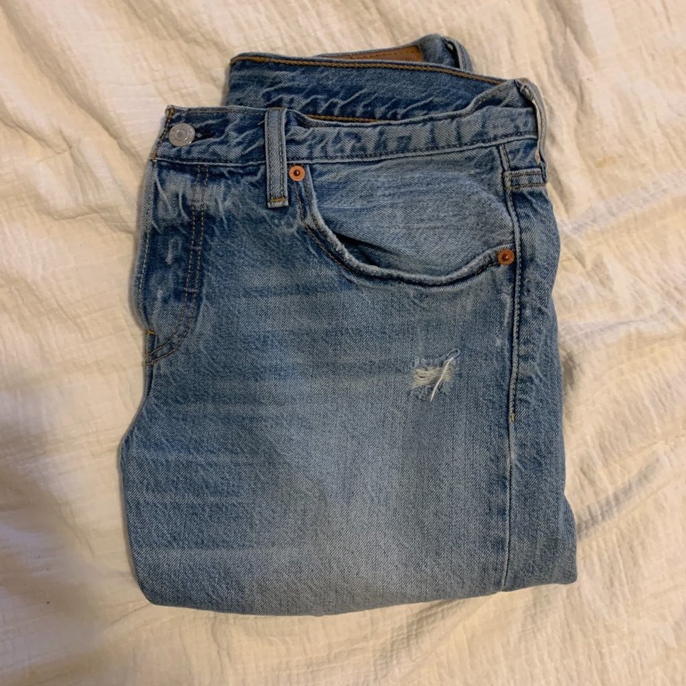 distressed levis 501 ct jeans